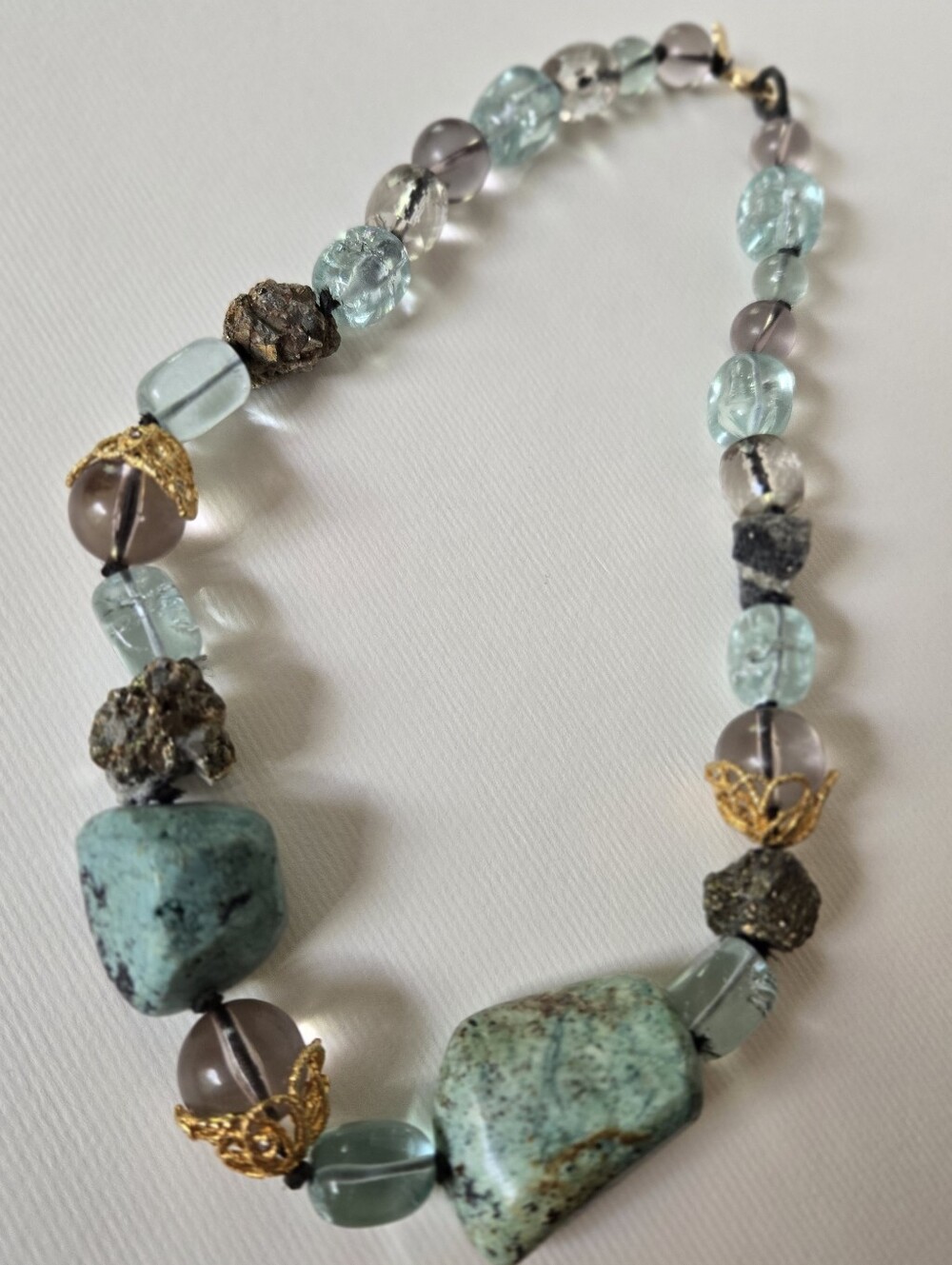 Alexis Bittar hand-knotted turquoise and glass bead statement necklace
